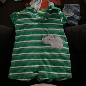 Green and white striped Romber. Rhino 0-8 months